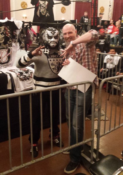 Chris and Pentagon Jr. throwing the "cero miedo" signs that are the luchador's trademark.